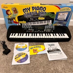 Practically new keyboard/piano for kids. All parts included except USB cable